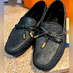 Louis Vuitton Gloria loafers.